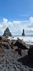 Black Sand Beach with Basalt Columns and Sea Stacks in Iceland
