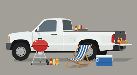 A white pickup truck is parked with its tailgate down, hosting a barbecue setup with grills, a cooler, and a striped beach chair, suggesting a fun and relaxed outdoor gathering © arfanah02