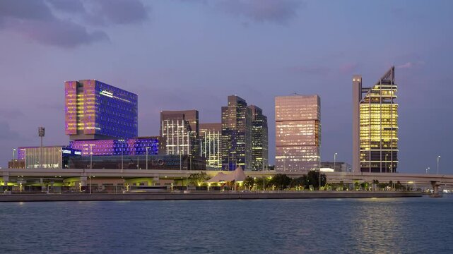 sunset sky light abu dhabi modern bay hospital exterior panorama timelapse 4k united arab emirates  