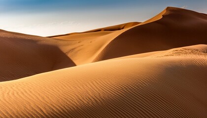 smooth sand dunes with soft curves under bright lighting natural desert texture forming abstract landscape composition