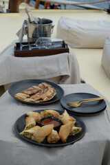 A plate of freshly fried Indonesian snacks, neatly arranged and ready to be served as a delicious afternoon treat.