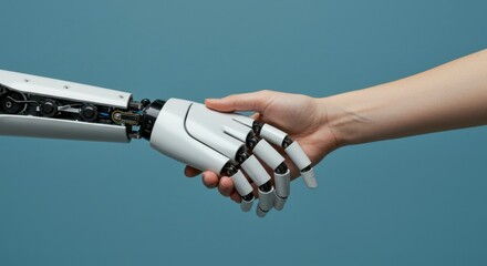 A robotic hand and a human hand shake, symbolizing collaboration between humans and artificial intelligence