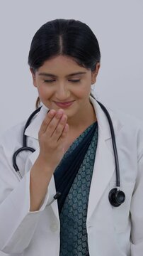 Vertical Video of Indian Female Doctor Greeting Adab