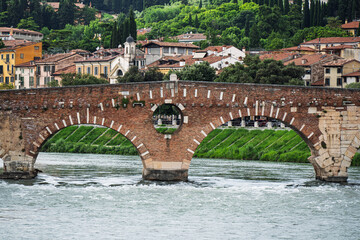 Adige river and Ponte di Castelvecchio in Verona, Italy.