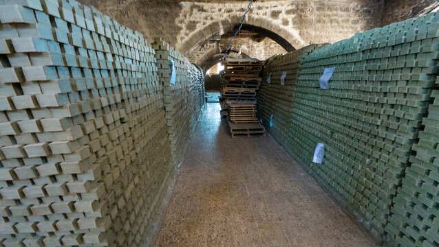 Corridor with Stacks of Green Soap Bars. Aleppo, Syria