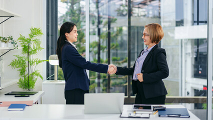 Business Partnership Agreement Meeting Young Professional Woman Handshake with Older Manager in Office Congratulating Human Resources Recruitment