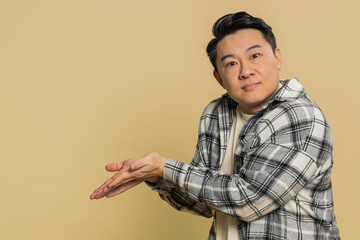 Asian mature man raising hands asking what why reason of failure, disbelief irritation by troubles...
