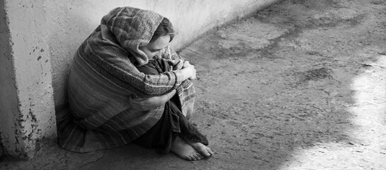 Frozen girl sitting on the floor
