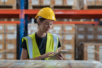 Warehouse and female worker working with digital tablet for inspection, inventory and checking stock, distribution, logistics in warehouse