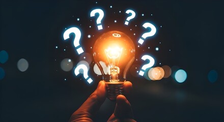 Person holding a glowing light bulb surrounded by glowing question marks and bokeh lights