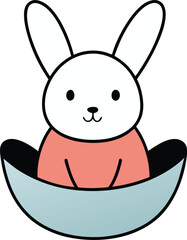 Fototapeta premium Baby rabbit sitting on a toy swing