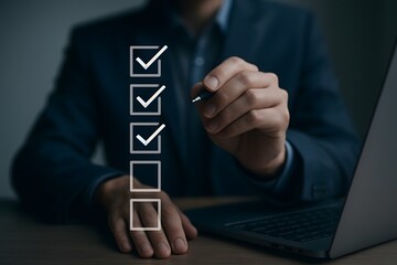 Man in suit checking off items on a digital to do list
