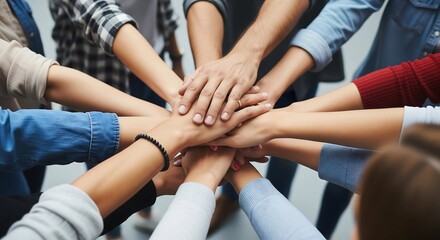 Fototapeta premium Diverse Group of Hands Stacked Together - Teamwork and Unity - Community and Collaboration