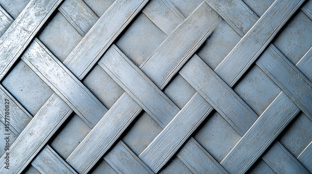 Aufkleber close-up of a blue wooden lattice with a weathered, textured surface showing an intersecting crisscr