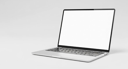 A modern laptop computer with a blank, bright white screen.
