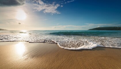Obraz premium close up of serene sandy beach with gentle waves lapping at shore