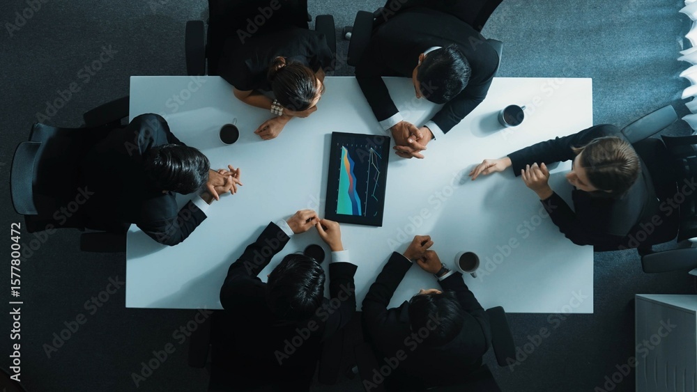 Poster time lapse of professional business team discuss and analyze data. top down aerial of group of diver