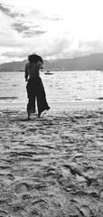 WOMAN ALONE ON THE BEACH, PEACE, FREEDOM, HOLIDAYS, TRANQUILITY, LANDSCAPE