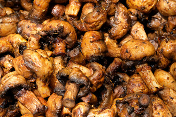 Juicy grilled mushrooms ready to delight food lovers at the market