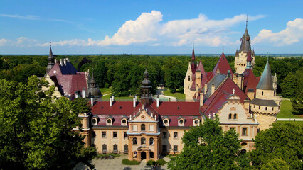 Fototapeta premium Moszna Castle fly over landscape view from above architecture near the village Moszna Poland