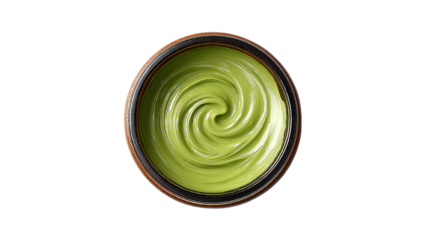 Delicious creamy green matcha powder blend in a bowl, perfect for desserts or beverages.