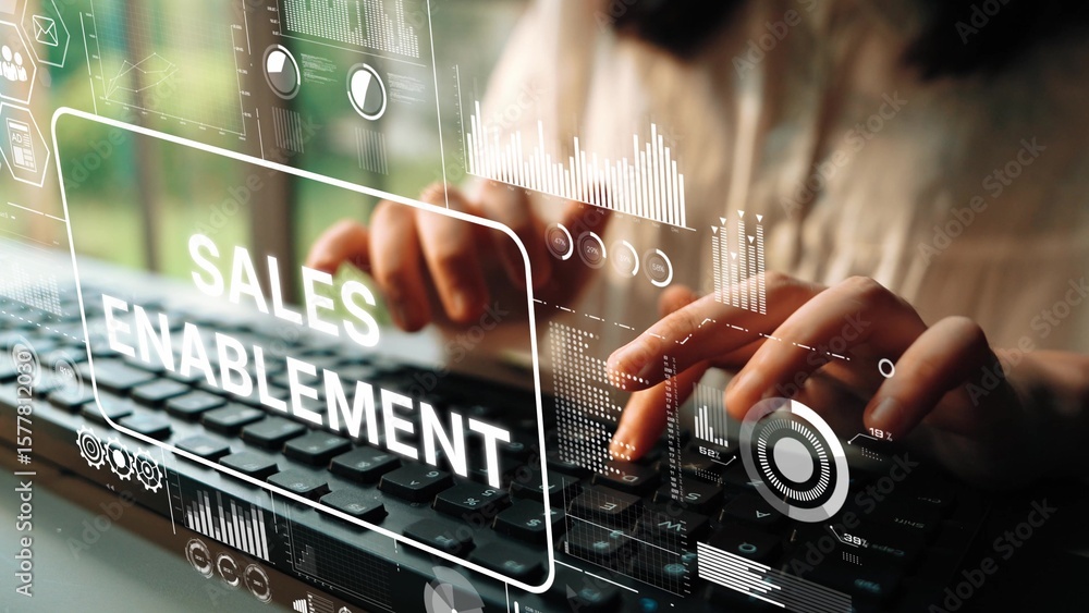 Poster creative workspace for sales enablement with digital overlays and hands on keyboard. asymptotic smar
