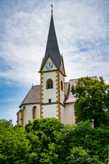 A view of the churches of Maria Wörth on Lake Wöhrtersee in Austria.