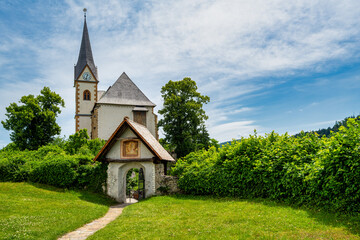 A view of the churches of Maria Wörth on Lake Wöhrtersee in Austria.