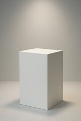 Minimalist white pedestal for product display with soft focused lighting