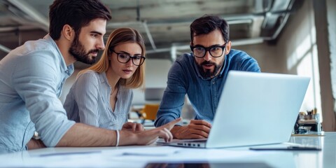 Collaborative scene of businesswoman and male coworkers using laptop to discuss project ideas and future plans in an open office environment with modern design