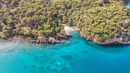 Obraz premium defaultKorsan Cove. Located in the Kumluca district, Korsan Cove ( K is a small and clean bay containing the ruins of the Ancient City of Melanippe, to the west of Gelidonya Feneri. Korsan Koyu Karaoz