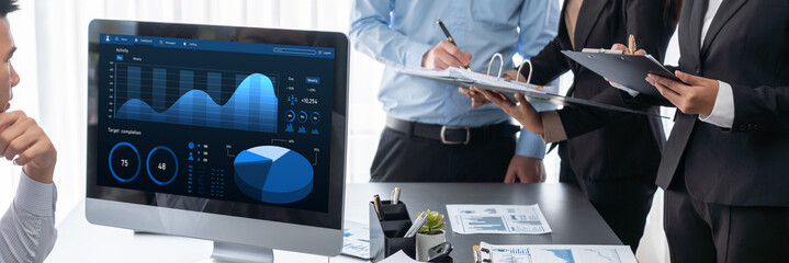 Business intelligence and data analysis concept. Analyst team working on financial data analysis...