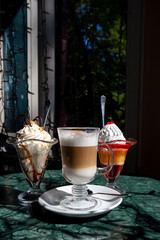 Delighting in sweet desserts at a cozy cafe on a sunny afternoon