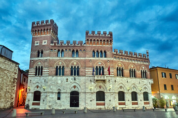 The towers of the Renaissance brick castle in Grosseto at night