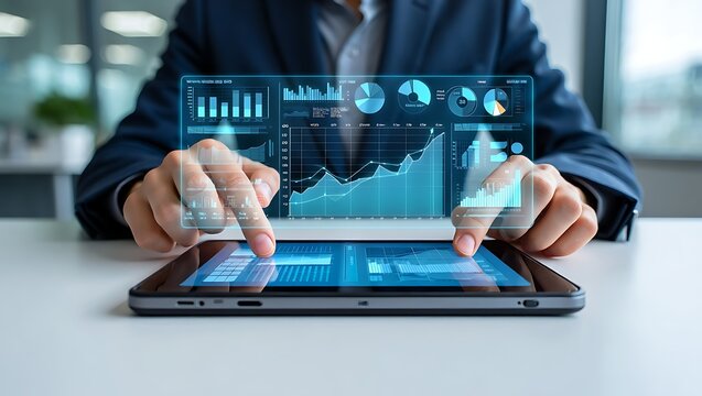 Businessman interacting with a futuristic holographic interface displaying financial charts and data on a tablet computer showcasing business analytics and technology