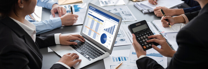 Business intelligence and data analysis concept. Analyst team working on financial data analysis...