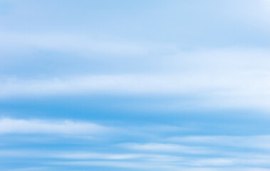 Beautiful blue sky and white fluffy group of clouds background in the morning skyline
