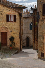 Via di Mezzo Street starting from the area facing the Pieve dei Santi Leonardo e Cristoforo Parish...