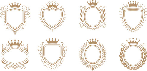 Collection of ornate golden shields and oval frames with crowns and decorative elements