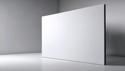 Fototapeta premium A large, blank white screen stands in a minimalist room, offering ample copy space