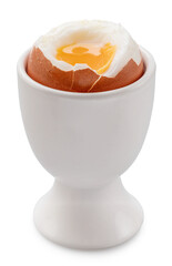 Soft -boiled partly peeled chicken egg with soft yolk in egg cup.