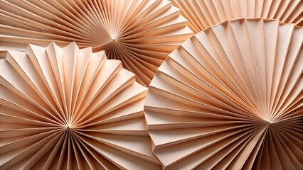 Several beige paper fans with intricate pleats are arranged in a pleasing composition, creating a textured background