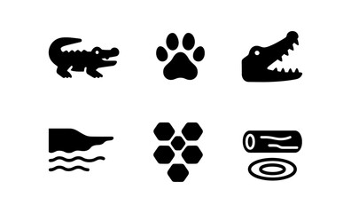 Animal silhouette icons: crocodile, paw print, and honeycomb design set