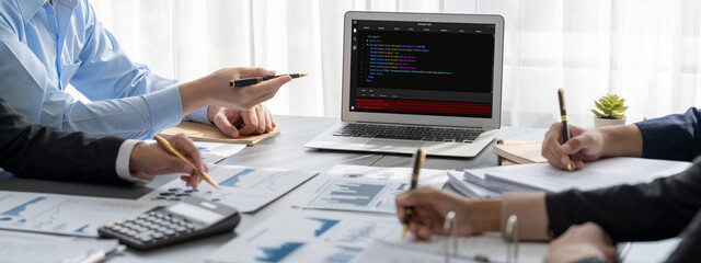 Business intelligence and data analysis concept. Analyst team working on financial data analysis...