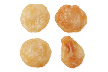 Dried longan fruits displaying progressive dehydration stages, close-up view against transparent backdrop
