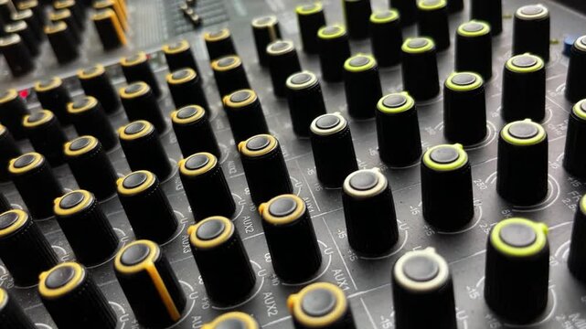 electronic tune button components on an audio mixer