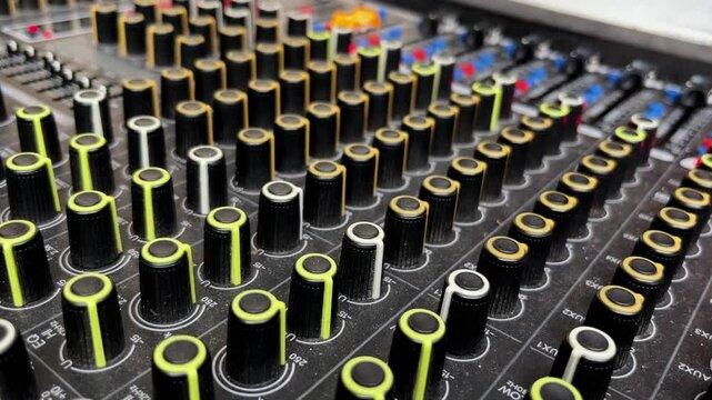electronic tune button components on an audio mixer