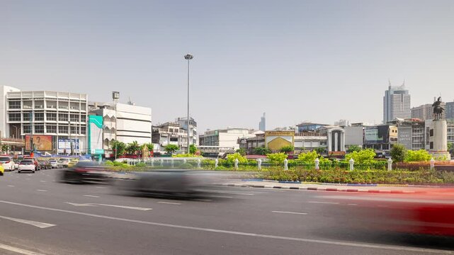sunny day bangkok city traffic street king taksim monument square panorama 4k timelapse thailand
