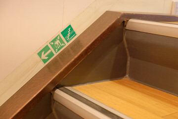 The ferry Norderaue has symbols for marking escape routes are glued on luminous strips on the stairs