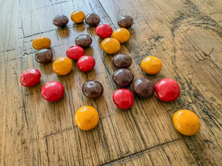 Hard shell chocolate candies in autumn colors